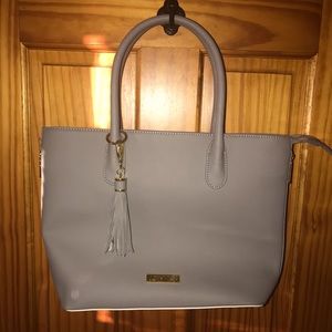 New Joy Iman leather purse.